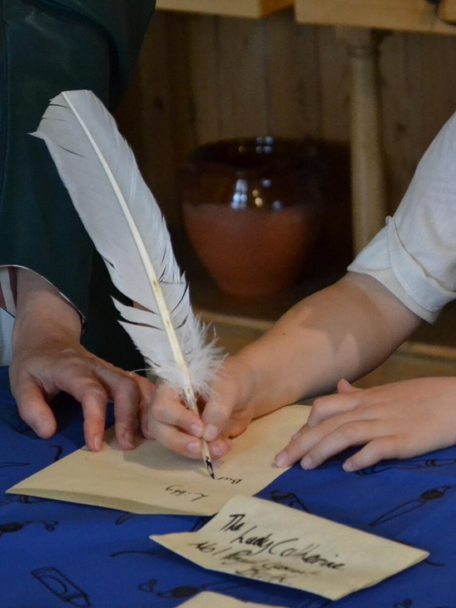 Writing-with-a-quill-and-ink-5-e1758725128428