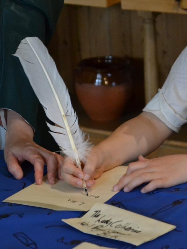 Writing-with-a-quill-and-ink-5-e1758725128428